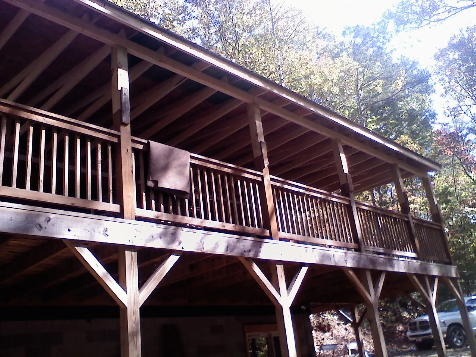 Timber framing under a new elevated porch and deck — Roof Leak Repair in East Freedom by Roofing Brothers
